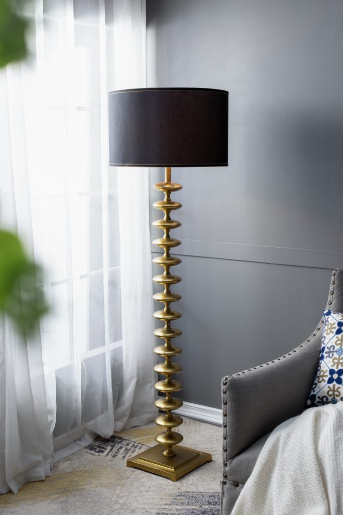 Gold and Black Floor Lamp with Contemporary Disc